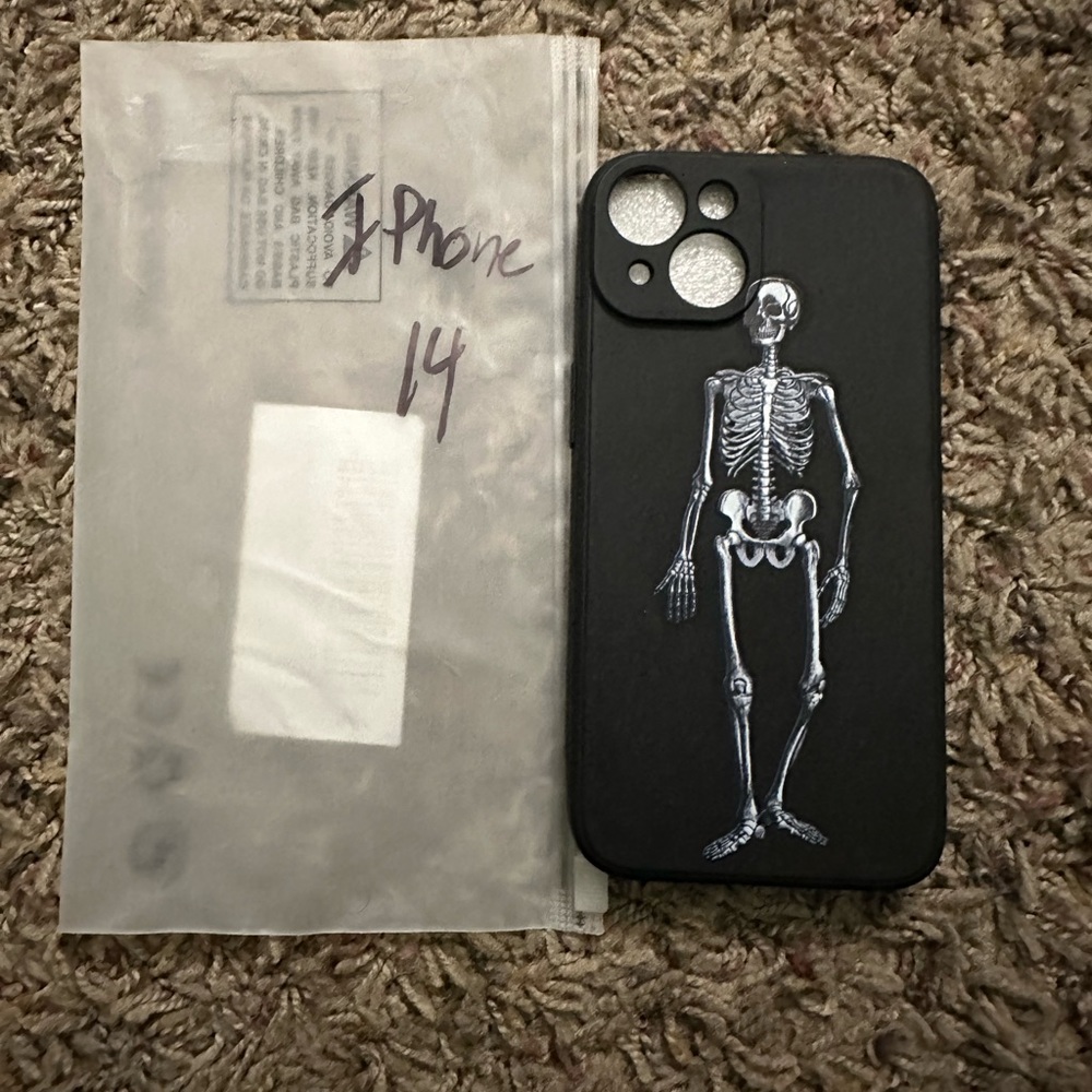 iPhone 14 skeleton phone case. Never before used. Perfect condition!